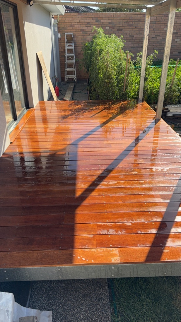 Freshly oiled hardwood deck